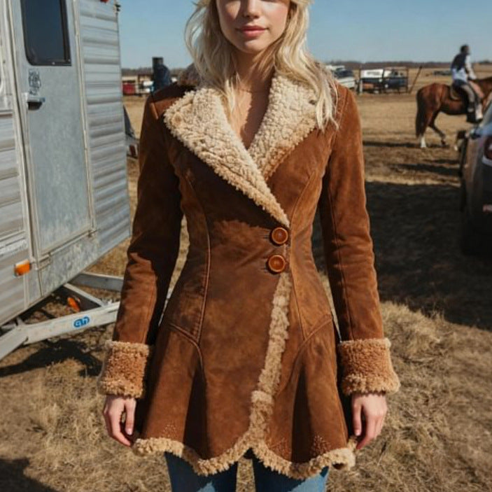 Woman wearing a brown shearling-lined winter coat outdoors, featuring a plush collar and tailored fit for cold weather style